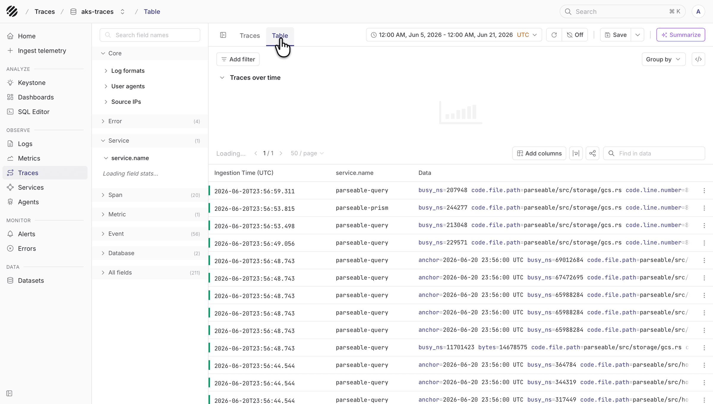 Traces table view showing span records, fields, and table controls